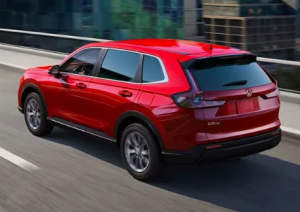 A 2024 Honda CR-V driving down a street near indianapolis, Indiana.