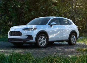 A white 2024 Honda HR-V parked near grass and trees near Indianapolis, Indiana.
