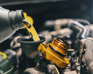 An oil change being performed at a Honda service center near Anderson, Indiana.