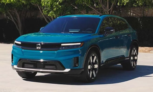 A blue 2024 Honda Prologue parked near some trees near Indianapolis, Indiana